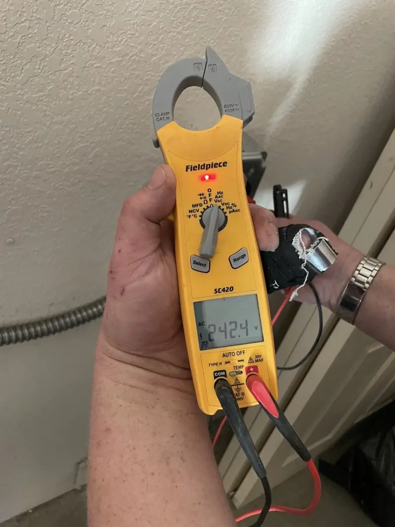 Voltage testing with clamp meter during Aluminum Wiring Replacement in Ann Arbor